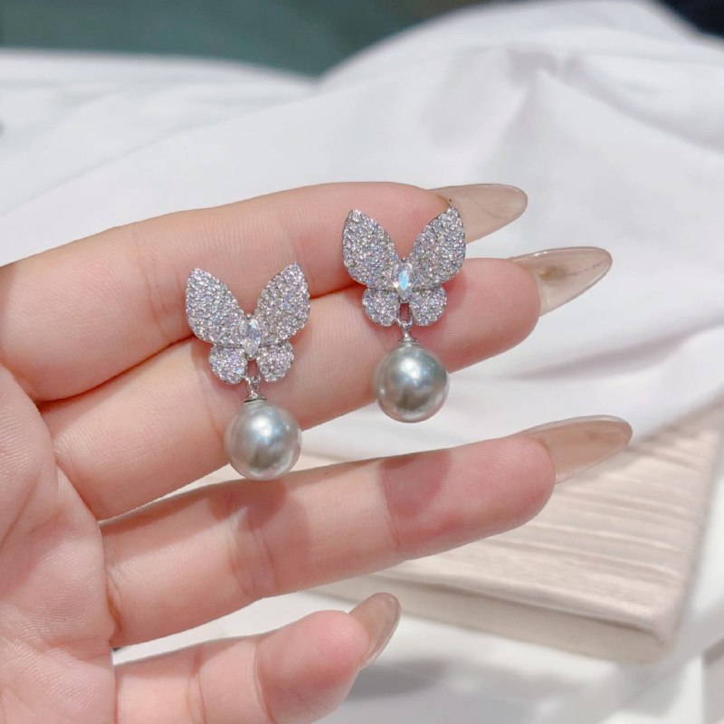 Boucles d'oreilles Van Cleef & Arpels papillon perle